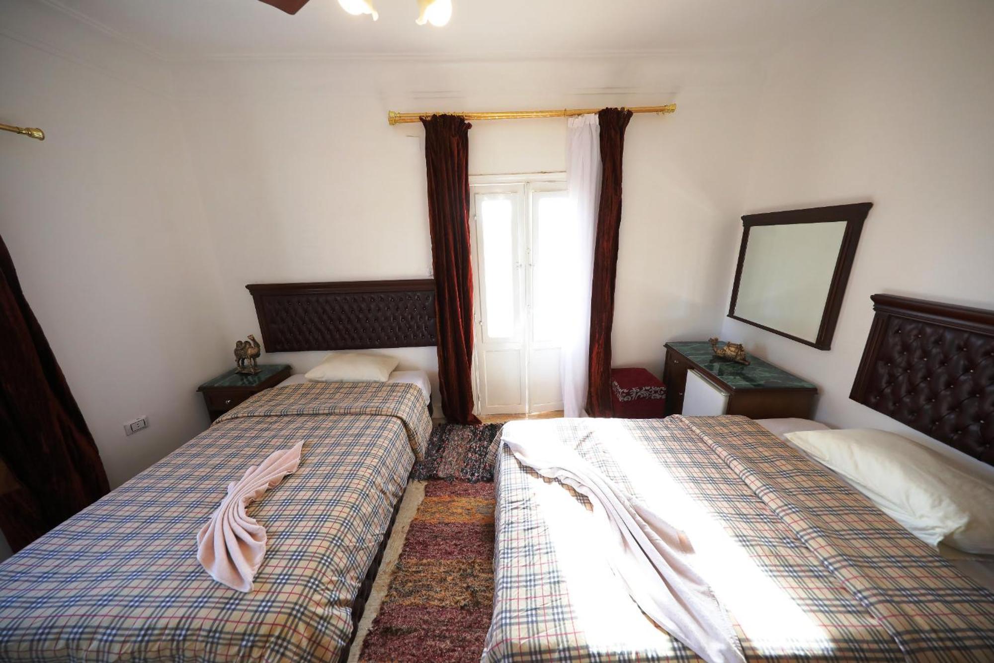 Pyramids Loft Guesthouse Kairo Rum bild