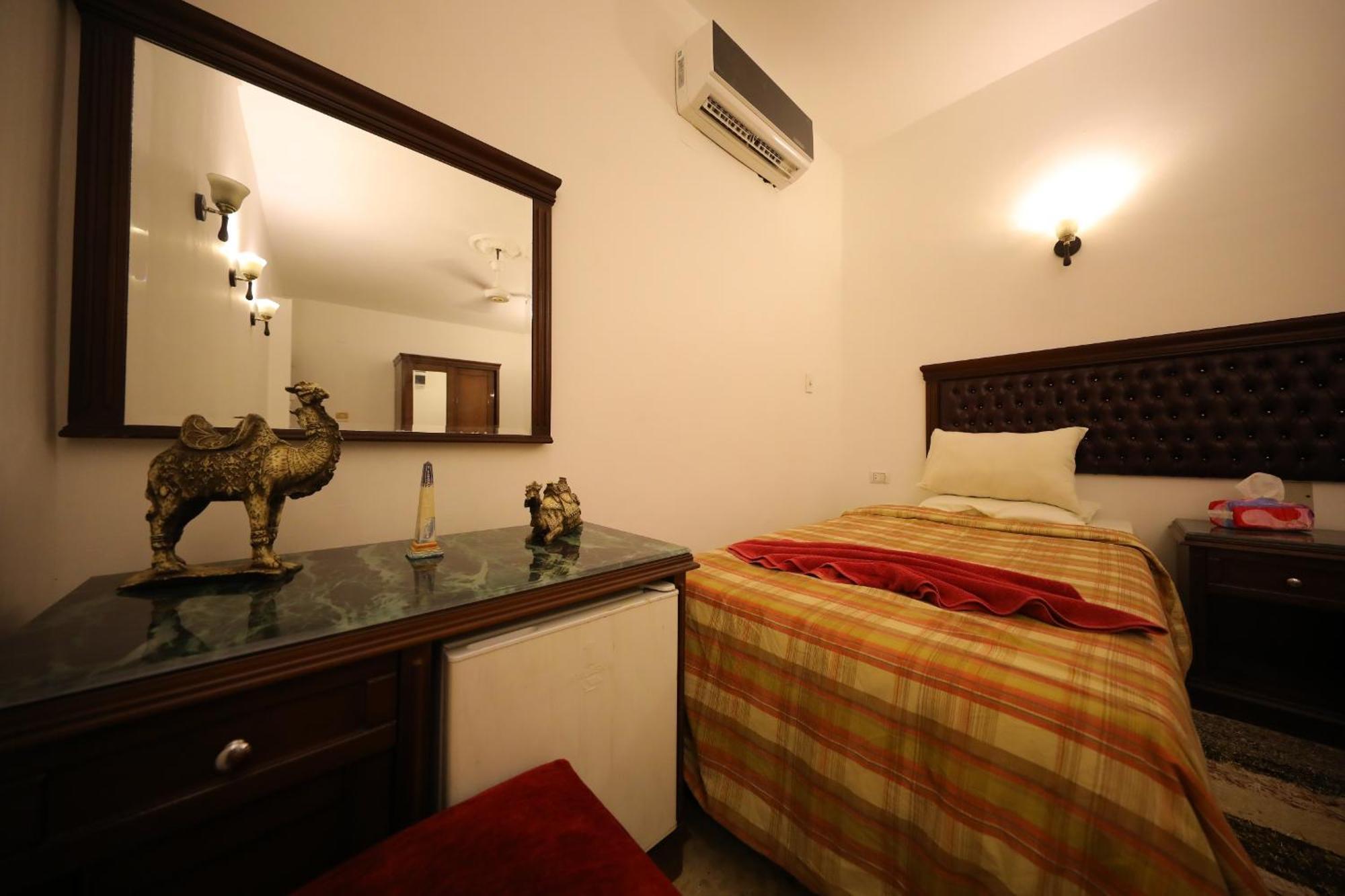 Pyramids Loft Guesthouse Kairo Rum bild