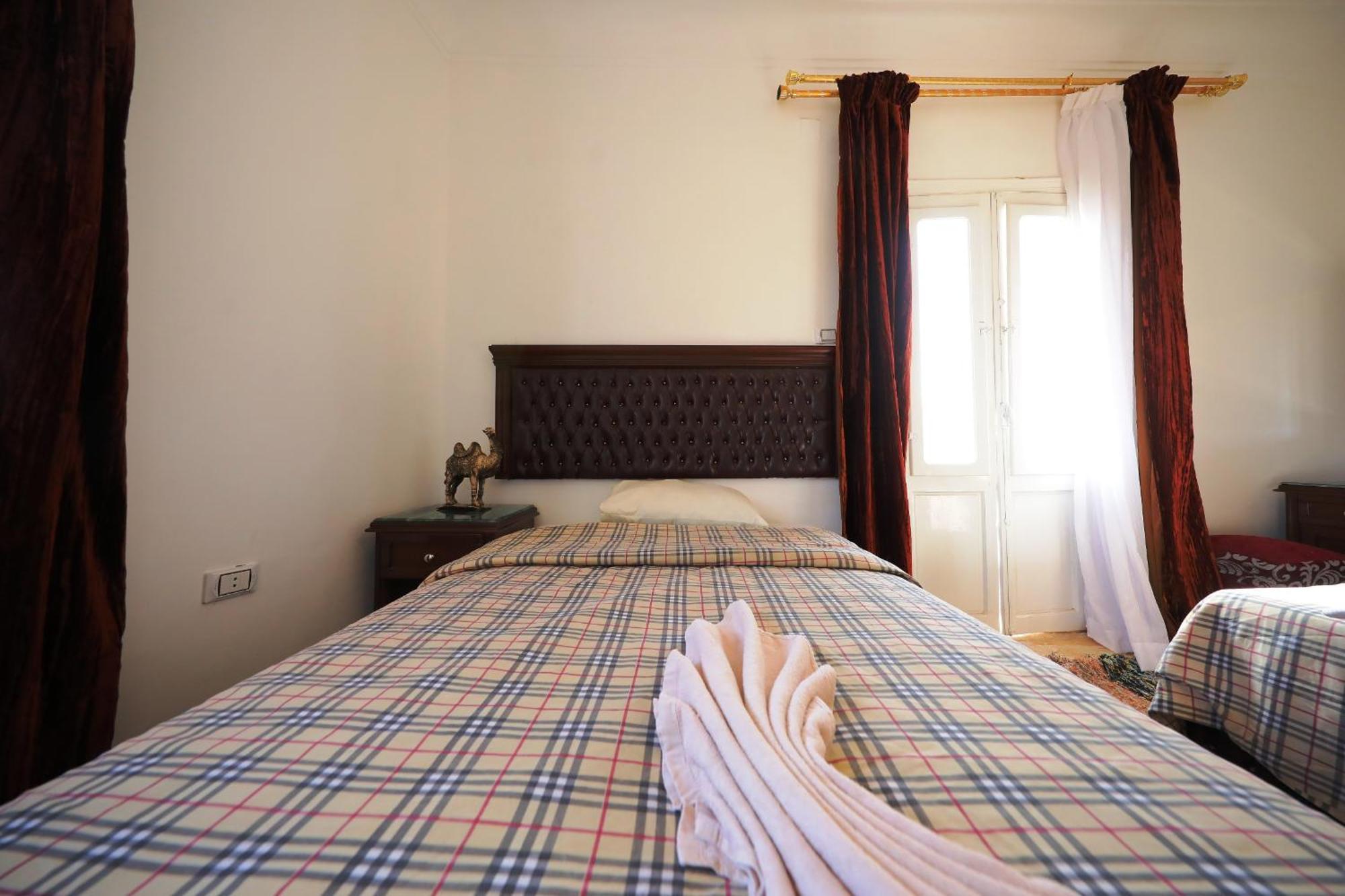 Pyramids Loft Guesthouse Kairo Rum bild
